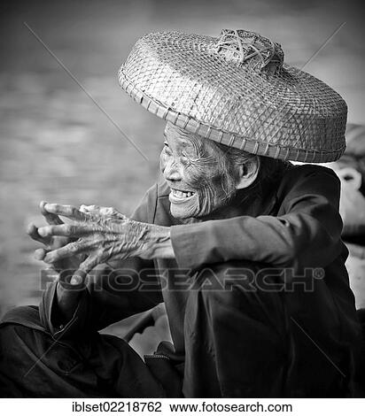 "Smiling old woman wearing a straw hat at the floating market, Damnoen Saduak, Thailand, Southeast Asia, Asia" View Large Photo Image Stock Image - "Smiling old woman wearing a straw hat at the floating market, Damnoen Saduak, Thailand, Southeast Asia, Asia". Fotosearch