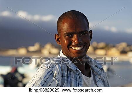 "Smiling Omani man, Mirbat, Dhofar region, Sultanate of Oman, Arabian Peninsula" View Large Photo Image Stock Photo - "Smiling Omani man, Mirbat, Dhofar region, Sultanate of Oman, Arabian Peninsula". Fotosearch