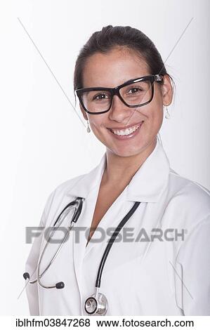 "Smiling young doctor with stethoscope and glasses, portrait" View Large Photo Image Stock Photo - "Smiling young doctor with stethoscope and glasses, portrait". Fotosearch