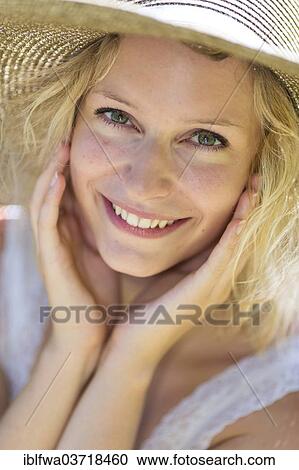 "Smiling young woman with summer hat, Waidhofen an der Ybbs, Lower Austria, Austria, Europe" View Large Photo Image Stock Image - "Smiling young woman with summer hat, Waidhofen an der Ybbs, Lower Austria, Austria, Europe". Fotosearch