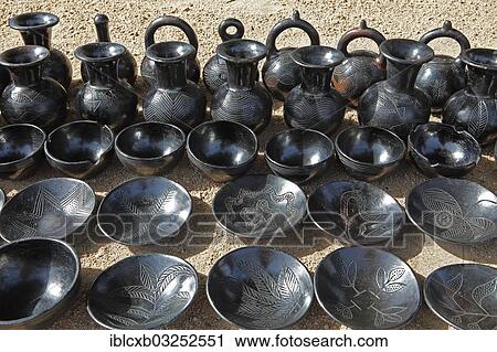 Stock Image - "Smoked pottery from clay, cow dung and goat dung, Rhumsiki, Far North, Cameroon, Africa". Fotosearch