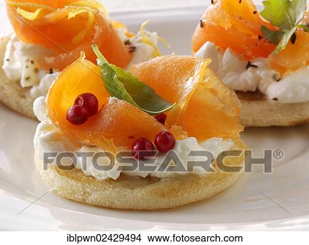 Smoked salmon and cream cheese blini canapes View Large Photo Image Picture - Smoked salmon and cream cheese blini canapes. Fotosearch