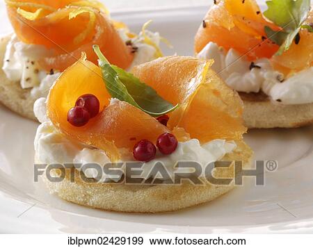 Smoked salmon and cream cheese blinis View Large Photo Image Stock Photo - Smoked salmon and cream cheese blinis. Fotosearch