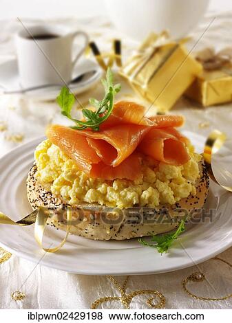 Smoked salmon on scrambled egg bagel View Large Photo Image Stock Photo - Smoked salmon on scrambled egg bagel. Fotosearch