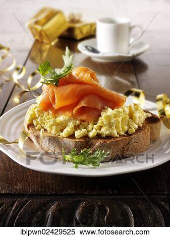 Smoked salmon on scrambled egg bagel View Large Photo Image Stock Photography - Smoked salmon on scrambled egg bagel. Fotosearch