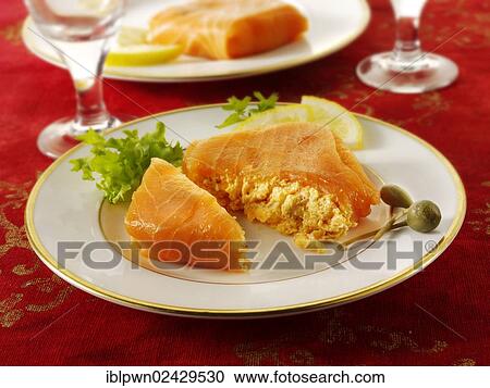 "Smoked salmon parcel filled with cream cheese and cream cheese and crab, in a party buffet setting" View Large Photo Image Stock Image - "Smoked salmon parcel filled with cream cheese and cream cheese and crab, in a party buffet setting". Fotosearch