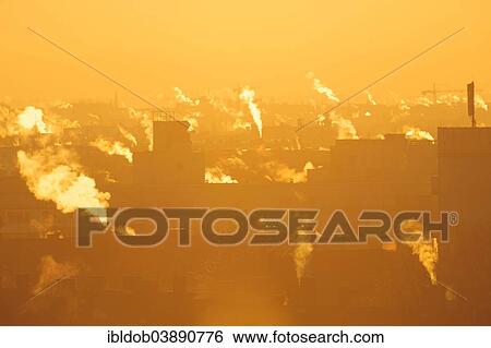 "Smoking chimneys at dawn in very cold weather, Munich, Upper Bavaria, Bavaria, Germany, Europe" View Large Photo Image Stock Photograph - "Smoking chimneys at dawn in very cold weather, Munich, Upper Bavaria, Bavaria, Germany, Europe". Fotosearch