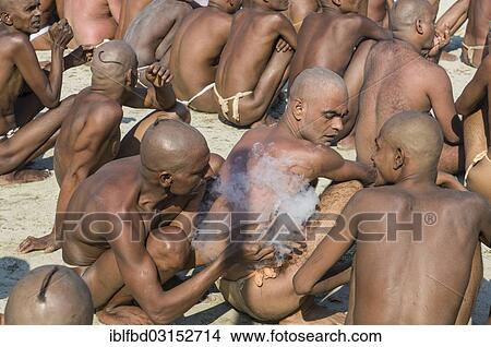 "Smoking marihuana as part of the initiation of new sadhus, during Kumbha Mela festival, Allahabad, Uttar Pradesh, India, Asia" View Large Photo Image Picture - "Smoking marihuana as part of the initiation of new sadhus, during Kumbha Mela festival, Allahabad, Uttar Pradesh, India, Asia". Fotosearch
