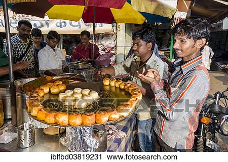 Stock Image - "Snacks for sale at Mangaldas Market, Mumbai, Maharashtra, India, Asia". Fotosearch