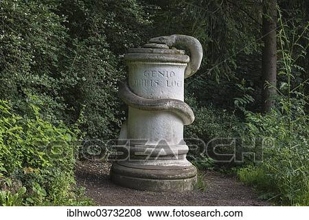 "Snake's Stone in the park with the inscription """"Genio huius loci"""", """"to the spirit of this place"""", Ilm Park, Weimar, Thuringia, Germany, Europe" View Large Photo Image Stock Photo - "Snake's Stone in the park with the inscription """"Genio huius loci"""", """"to the spirit of this place"""", Ilm Park, Weimar, Thuringia, Germany, Europe". Fotosearch