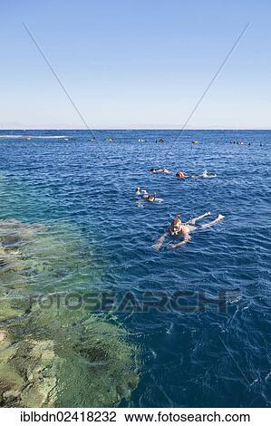 Snorkellers at the Blue Hole dive site near Dahab, Sinai, Egypt, Africa View Large Photo Image Stock Image - Snorkellers at the Blue Hole dive site near Dahab, Sinai, Egypt, Africa. Fotosearch
