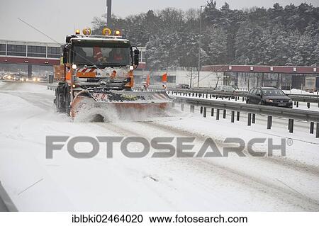 Stock Image - "Snow being cleared from the road, A115 motorway in winter, Berlin, Germany, Europe". Fotosearch