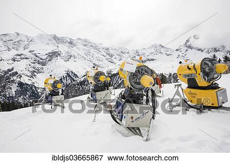 "Snow cannon and snow-covered mountains, Alp Gimmeln, Murren, Bernese Oberland, Canton of Bern, Switzerland, Europe" View Large Photo Image Stock Photo - "Snow cannon and snow-covered mountains, Alp Gimmeln, Murren, Bernese Oberland, Canton of Bern, Switzerland, Europe". Fotosearch