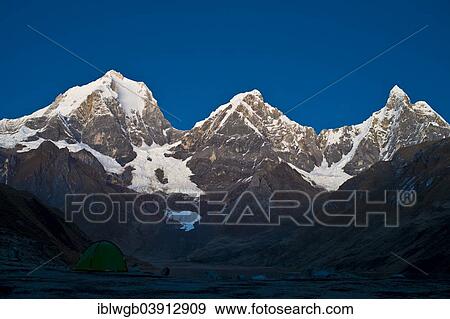 "Snow capped mountains in morning light, Siula Grande, left, Yerupaja Grande, Yerupaja Chico and Jirishanca, right, Cordillera Huayhuash mountain range, Andes, northern Peru, Peru, South America" View Large Photo Image Stock Photo - "Snow capped mountains in morning light, Siula Grande, left, Yerupaja Grande, Yerupaja Chico and Jirishanca, right, Cordillera Huayhuash mountain range, Andes, northern Peru, Peru, South America". Fotosearch