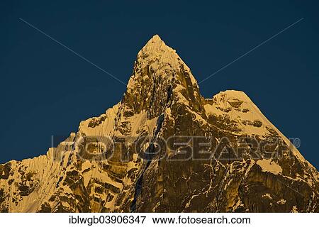 "Snow-capped Mt Jirishanca Grande in the morning light, near Carhuacocha, Cordillera Huayhuash mountain range, Northern Peru, Peru, South America" View Large Photo Image Stock Photo - "Snow-capped Mt Jirishanca Grande in the morning light, near Carhuacocha, Cordillera Huayhuash mountain range, Northern Peru, Peru, South America". Fotosearch