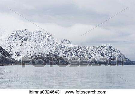 Stock Image - "Snow-covered mountain range, Smeerenburgfjorden, Spitsbergen Island, Svalbard Archipelago, Svalbard and Jan Mayen, Norway, Europe". Fotosearch