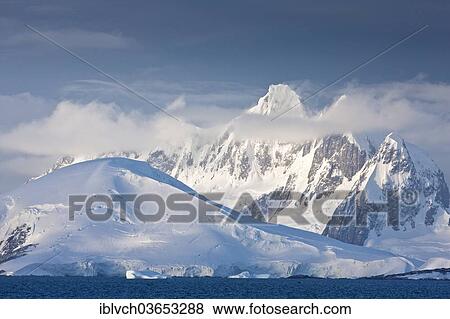 "Snow-covered mountains, Antarctic Peninsula, Antarctica" View Large Photo Image Stock Photo - "Snow-covered mountains, Antarctic Peninsula, Antarctica". Fotosearch