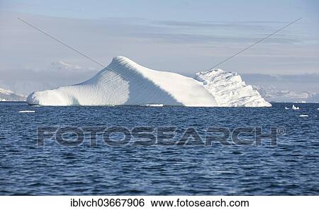 Stock Photograph - "Snow-covered mountains, Antarctic Peninsula, Antarctica". Fotosearch