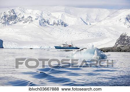 "Snow-covered mountains, rocks, Russian research ship, Antarctic Peninsula, Antarctica" View Large Photo Image Stock Photo - "Snow-covered mountains, rocks, Russian research ship, Antarctic Peninsula, Antarctica". Fotosearch