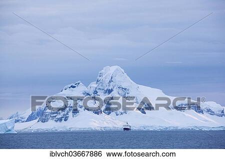 "Snow-covered mountains, rocks, ship, Antarctic Peninsula, Antarctica" View Large Photo Image Stock Photograph - "Snow-covered mountains, rocks, ship, Antarctic Peninsula, Antarctica". Fotosearch