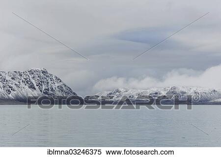 Stock Photography - "Snow-covered mountains, Smeerenburgfjorden, Spitsbergen Island, Svalbard Archipelago, Svalbard and Jan Mayen, Norway, Europe". Fotosearch
