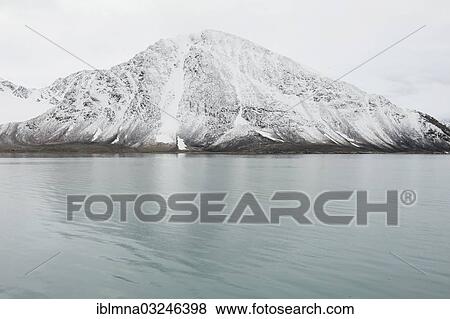 "Snow-covered Smeerenburg Mountain, Smeerenburgfjorden, Amsterdamoya, Svalbard Archipelago, Svalbard and Jan Mayen, Norway, Europe" View Large Photo Image Stock Photo - "Snow-covered Smeerenburg Mountain, Smeerenburgfjorden, Amsterdamoya, Svalbard Archipelago, Svalbard and Jan Mayen, Norway, Europe". Fotosearch