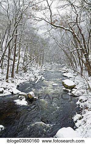 Stock Image - "Snow landscape in the Bodetal Nature Reserve with the Bode River, Harz mountain range, Saxony-Anhalt, Germany, Europe". Fotosearch