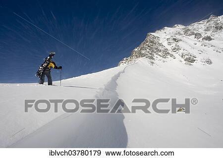 "Snowboarder, freerider, during the ascent, near Kuhtai, Tyrol, Austria, Europe" View Large Photo Image Stock Photo - "Snowboarder, freerider, during the ascent, near Kuhtai, Tyrol, Austria, Europe". Fotosearch