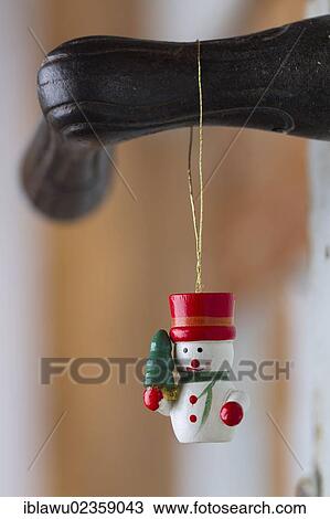 "Snowman, Christmas decoration on an old doorknob" View Large Photo Image Stock Image - "Snowman, Christmas decoration on an old doorknob". Fotosearch