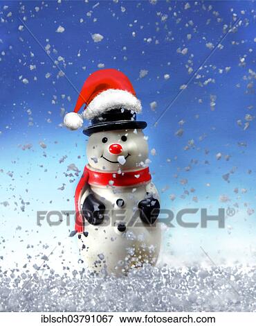 Snowman figure with a Santa Claus hat in the snow View Large Photo Image Stock Photo - Snowman figure with a Santa Claus hat in the snow. Fotosearch