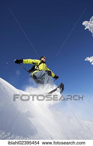 "Snowshoe hiker jumping, Hirschberg, Bavaria, Germany, Europe" View Large Photo Image Picture - "Snowshoe hiker jumping, Hirschberg, Bavaria, Germany, Europe". Fotosearch