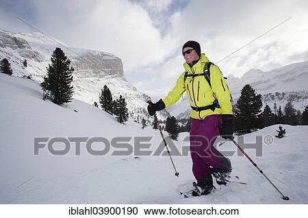 Stock Image - "Snowshoer in the Fanes range, San Vigilio, South Tyrol, Italy, Europe". Fotosearch