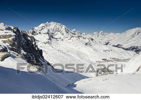 Snowy mountain landscape overlooking Tignes, Val d'Isere, Savoy, Alps, France, Europe View Large Photo Image Stock Photo - Snowy mountain landscape overlooking Tignes, Val d'Isere, Savoy, Alps, France, Europe. Fotosearch