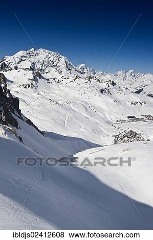 Snowy mountain landscape overlooking Tignes, Val d'Isere, Savoy, Alps, France, Europe View Large Photo Image Stock Photo - Snowy mountain landscape overlooking Tignes, Val d'Isere, Savoy, Alps, France, Europe. Fotosearch