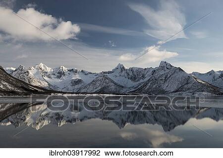 "Snowy mountains reflected in water, Vagan, Lofoten, Norway, Europe" View Large Photo Image Stock Image - "Snowy mountains reflected in water, Vagan, Lofoten, Norway, Europe". Fotosearch