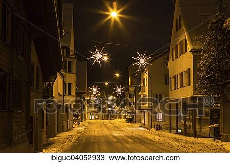 "Snowy street with Christmas lights, Malters, Lucerne, Switzerland, Europe" View Large Photo Image Stock Image - "Snowy street with Christmas lights, Malters, Lucerne, Switzerland, Europe". Fotosearch