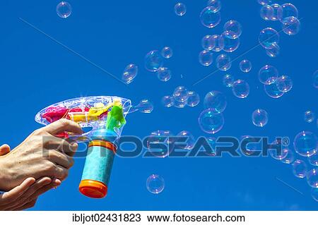 Soap bubbles from a bubble machine View Large Photo Image Stock Image - Soap bubbles from a bubble machine. Fotosearch