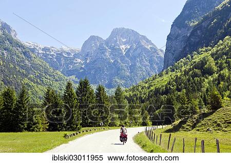 "Soca Valley, cyclist, in Triglav National Park, Julian Alps, near Bovec, Slovenia, Europe" View Large Photo Image Stock Photography - "Soca Valley, cyclist, in Triglav National Park, Julian Alps, near Bovec, Slovenia, Europe". Fotosearch