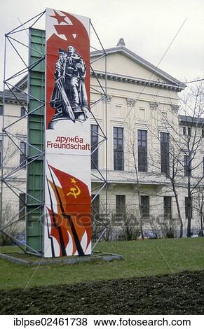 "Socialist propaganda sign, Druzhba Freundschaft, Russian and German for friendship, with flags of the USSR in front of a Neoclassical building in Weimar, in April 1985, GDR, German Democratic Republic, Europe" View Large Photo Image Stock Photo - "Socialist propaganda sign, Druzhba Freundschaft, Russian and German for friendship, with flags of the USSR in front of a Neoclassical building in Weimar, in April 1985, GDR, German Democratic Republic, Europe". Fotosearch
