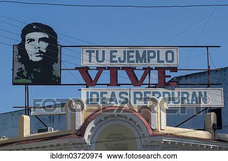 "Socialist slogan with a portrait of Che Guevara, Cienfuegos, Cienfuegos Province, Cuba, North America" View Large Photo Image Picture - "Socialist slogan with a portrait of Che Guevara, Cienfuegos, Cienfuegos Province, Cuba, North America". Fotosearch