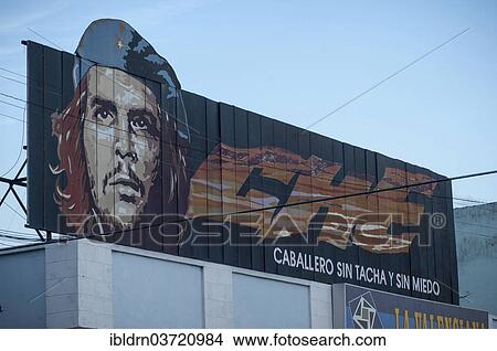 Picture - "Socialist slogan with a portrait of Che Guevara, Cienfuegos, Cienfuegos Province, Cuba, North America". Fotosearch