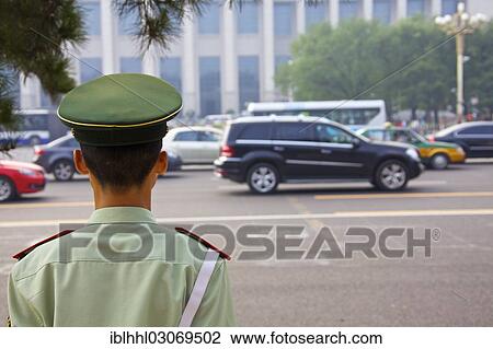"Soldier on the roadside, Beijing, China, People's Republic of China, Asia" View Large Photo Image Stock Image - "Soldier on the roadside, Beijing, China, People's Republic of China, Asia". Fotosearch