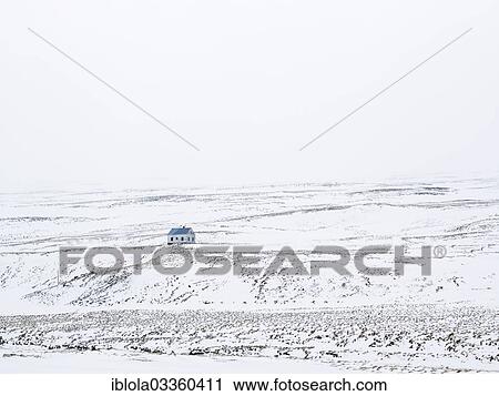 Stock Image - "Solitary house in a wintry landscape, North Iceland, Iceland, Europe". Fotosearch