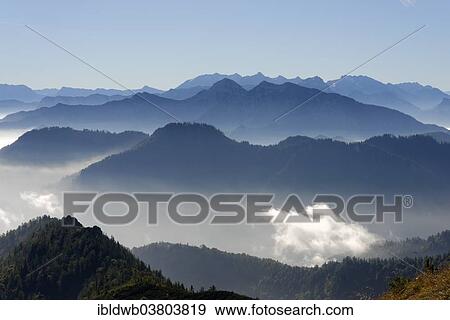 "Sonntagshorn and Vorderlahnerkogel in front of the Watzmann, Hochkalter and Hocheisspitze from Hochfelln, Bergen, Chiemgau Alps, Upper Bavaria, Bavaria, Germany, Europe" View Large Photo Image Stock Photo - "Sonntagshorn and Vorderlahnerkogel in front of the Watzmann, Hochkalter and Hocheisspitze from Hochfelln, Bergen, Chiemgau Alps, Upper Bavaria, Bavaria, Germany, Europe". Fotosearch