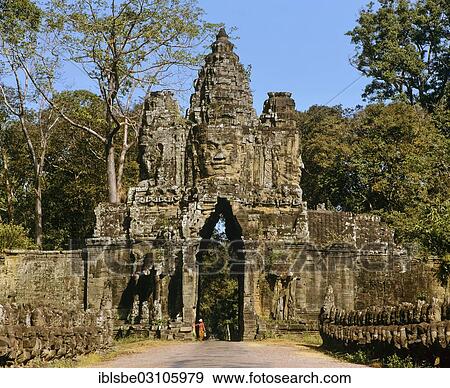 "South gate of Angkor Thom, face-tower, balustrade of demons on the bridge, Angkor Thom, Siem Reap Province, Cambodia, Asia" View Large Photo Image Stock Photo - "South gate of Angkor Thom, face-tower, balustrade of demons on the bridge, Angkor Thom, Siem Reap Province, Cambodia, Asia". Fotosearch