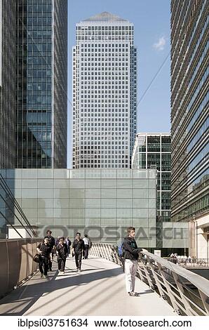 Picture - "South Quay footbridge with the """"One Canada Square"""" skyscraper at back, Canary Wharf, London, London region, England, United Kingdom, Europe". Fotosearch