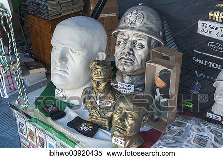 "Souvenir shop, heads of Mussolini and fascist symbols in a shop window, glorification of fascism, birthplace of Mussolini, Predappio, Emilia-Romagna, Italy, Europe" View Large Photo Image Stock Photography - "Souvenir shop, heads of Mussolini and fascist symbols in a shop window, glorification of fascism, birthplace of Mussolini, Predappio, Emilia-Romagna, Italy, Europe". Fotosearch