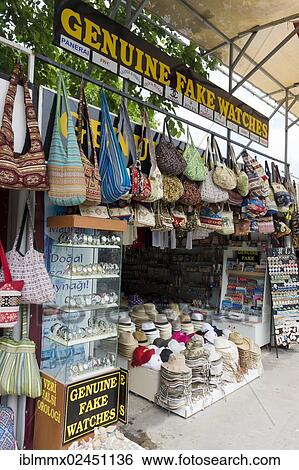 Stock Photograph - "Souvenir shop in front of the ancient city of Ephesus with plagiarised goods, fake watches, Efes, Turkey, Asia". Fotosearch