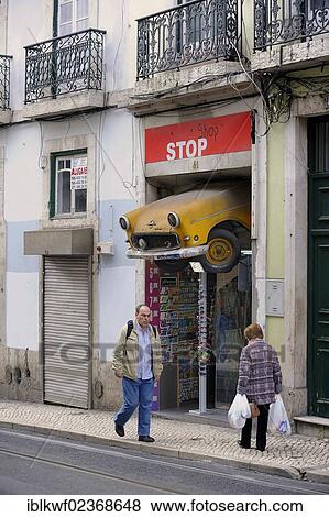 "Souvenir shop selling curiosities in the historic district, has a radiator of a car hanging above the entrance, Chiado district, Lisbon, Portugal, Europe" View Large Photo Image Stock Photo - "Souvenir shop selling curiosities in the historic district, has a radiator of a car hanging above the entrance, Chiado district, Lisbon, Portugal, Europe". Fotosearch