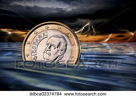 Spanish 1 euro coin sinking in the sea during a thunderstorm View Large Photo Image Picture - Spanish 1 euro coin sinking in the sea during a thunderstorm. Fotosearch